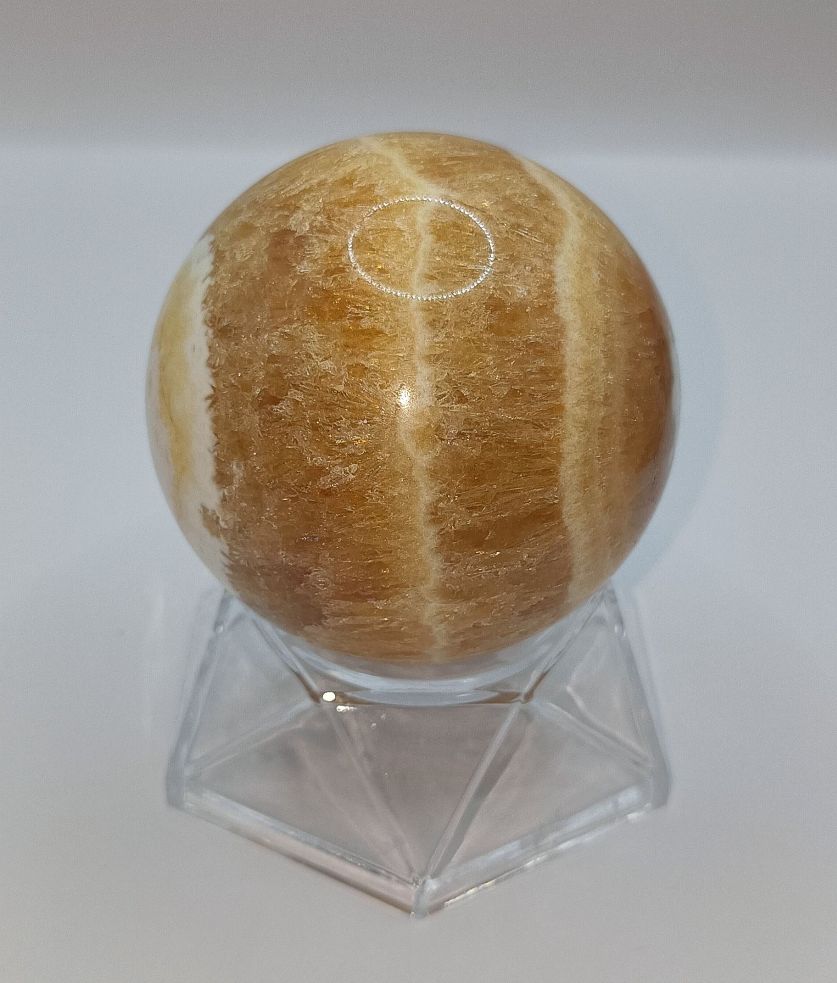 Sphère calcite orange rubanée AAA 60 à 70mm